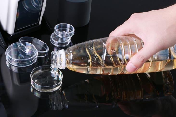 Liquid samples — oils, juices, syrups — filled into a dish